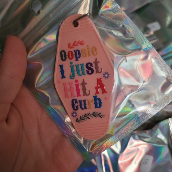 Oopsie I Just Hit A Curb Motel Keychain Funny Pink Car Key Ring Accessory - Picture 1 of 1